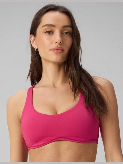 Fabletics PureLuxe Push-Up Low Impact Bra in vibrant fuchsia pink with scooped V-neck and shaped underbust band