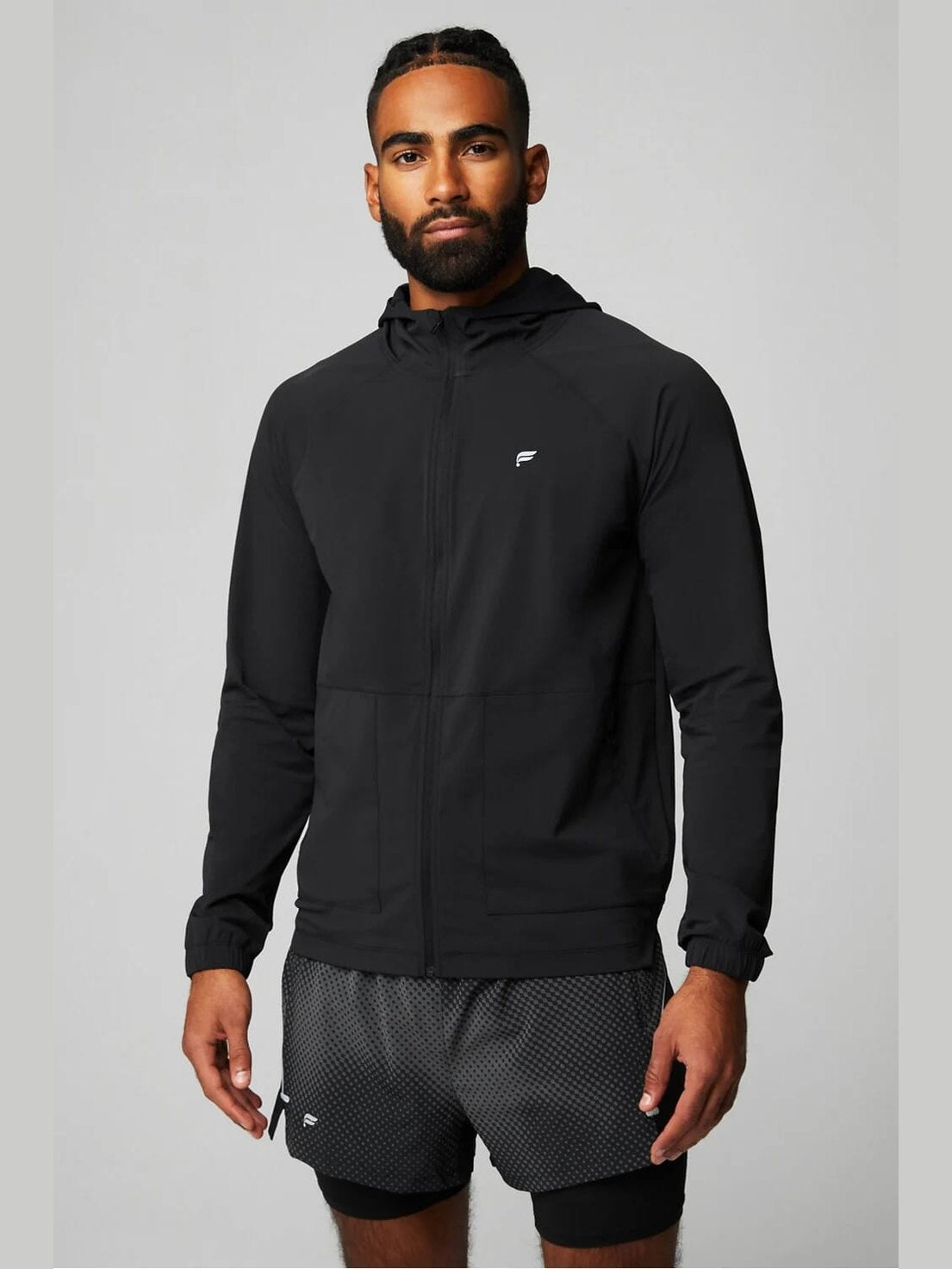 Men's black Fabletics The One full-zip hooded jacket with zip pockets and elastic cuffs