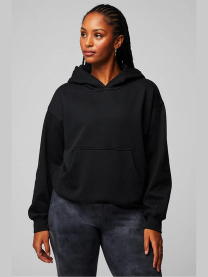 Women's black cropped Fabletics Cozy Fleece hoodie with kangaroo pocket and ribbed cuffs