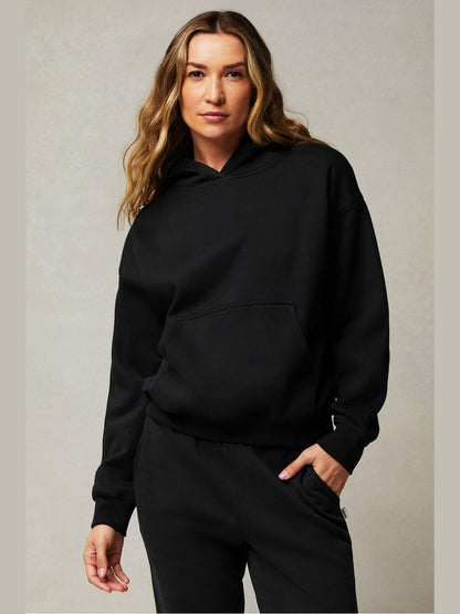 Fabletics black relaxed-fit Year Round Terry hoodie with kangaroo pocket and ribbed cuffs