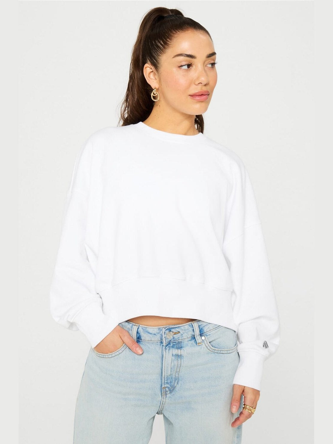 White cropped crew neck sweatshirt with drop shoulder, ribbed cuffs and textured year-round terry fabric