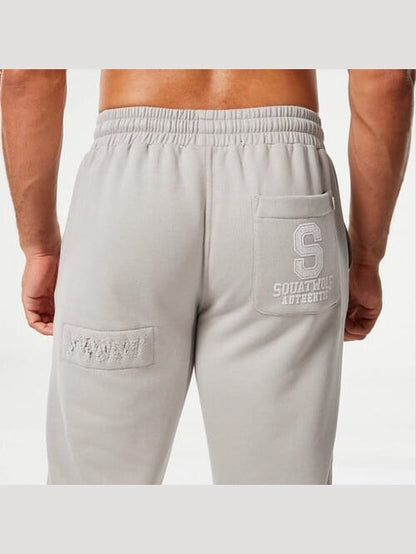 SQUATWOLF GOLDEN ERA RIPPED AND REPAIRED JOGGERS
