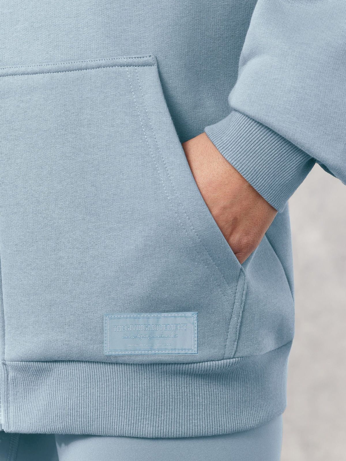 THE GIVING MOVEMENT COTTON OVERSIZED ZIP HOODIE