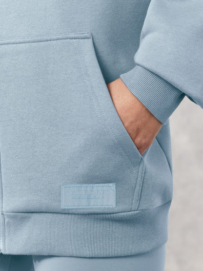 THE GIVING MOVEMENT COTTON OVERSIZED ZIP HOODIE