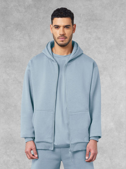 THE GIVING MOVEMENT COTTON OVERSIZED ZIP HOODIE