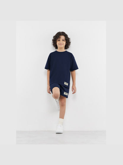 THE GIVING MOVEMENT KIDS SOFTSKIN OVERSIZED T-SHIRT