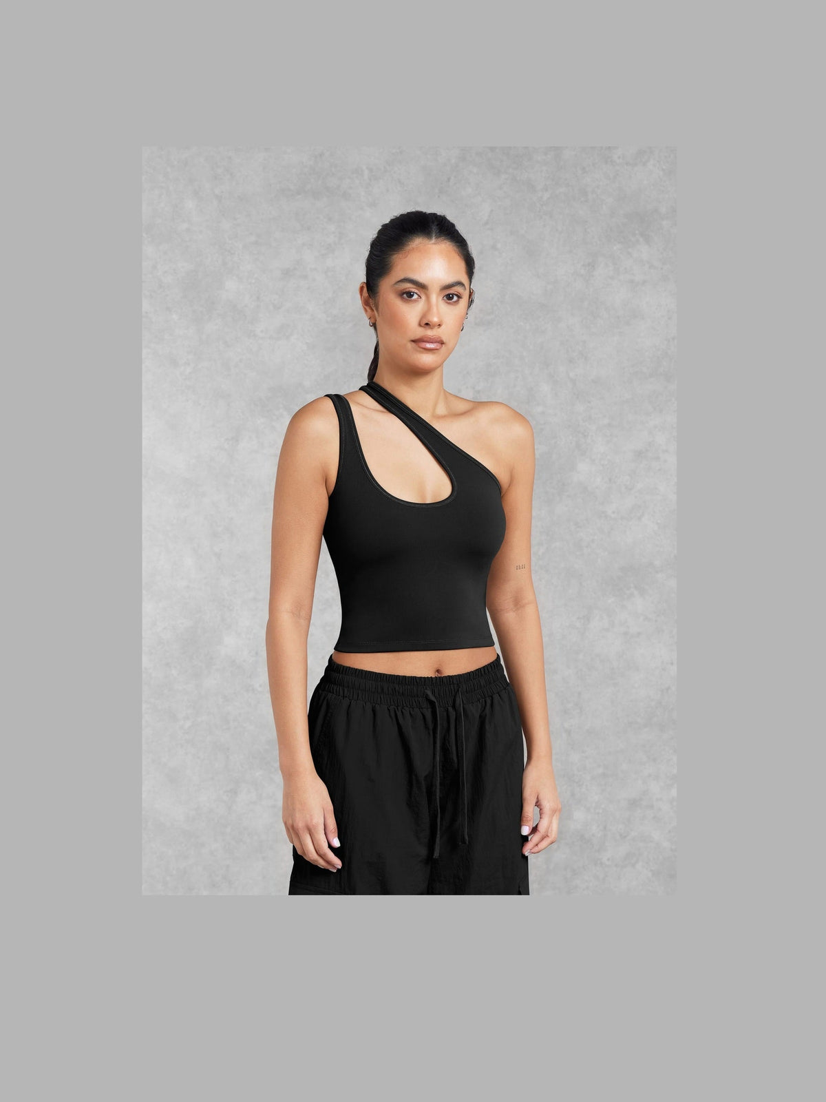 THE GIVING MOVEMENT SOFTSKIN ASYMMETRIC VEST