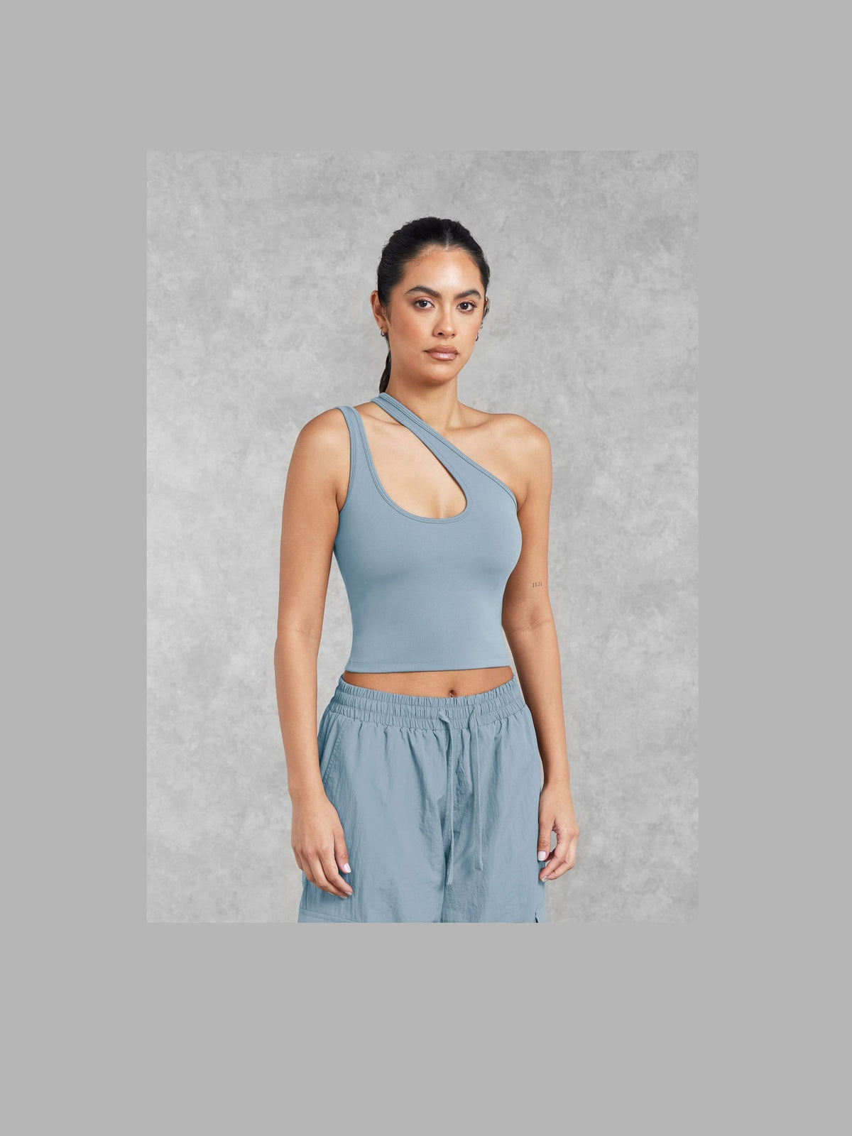 THE GIVING MOVEMENT SOFTSKIN ASYMMETRIC VEST