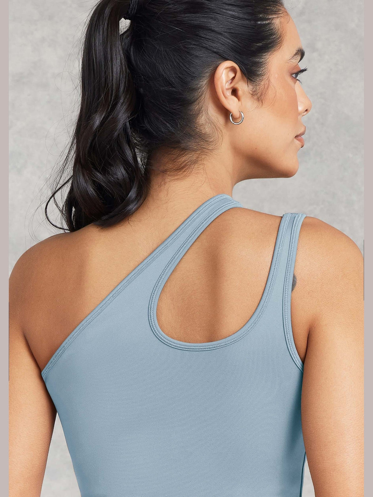 THE GIVING MOVEMENT SOFTSKIN ASYMMETRIC VEST