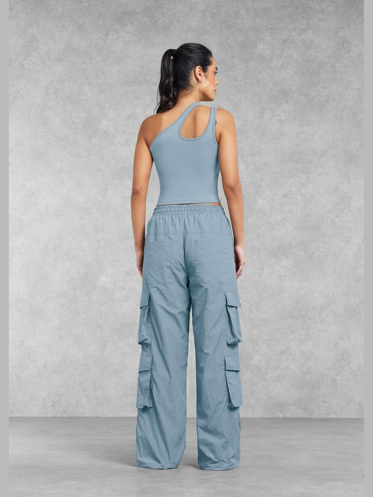 THE GIVING MOVEMENT SOFTSKIN ASYMMETRIC VEST