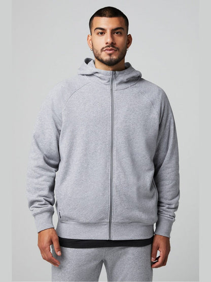 Men's heather gray Fabletics full zip hoodie with French terry fabric, raglan sleeves, and relaxed fit