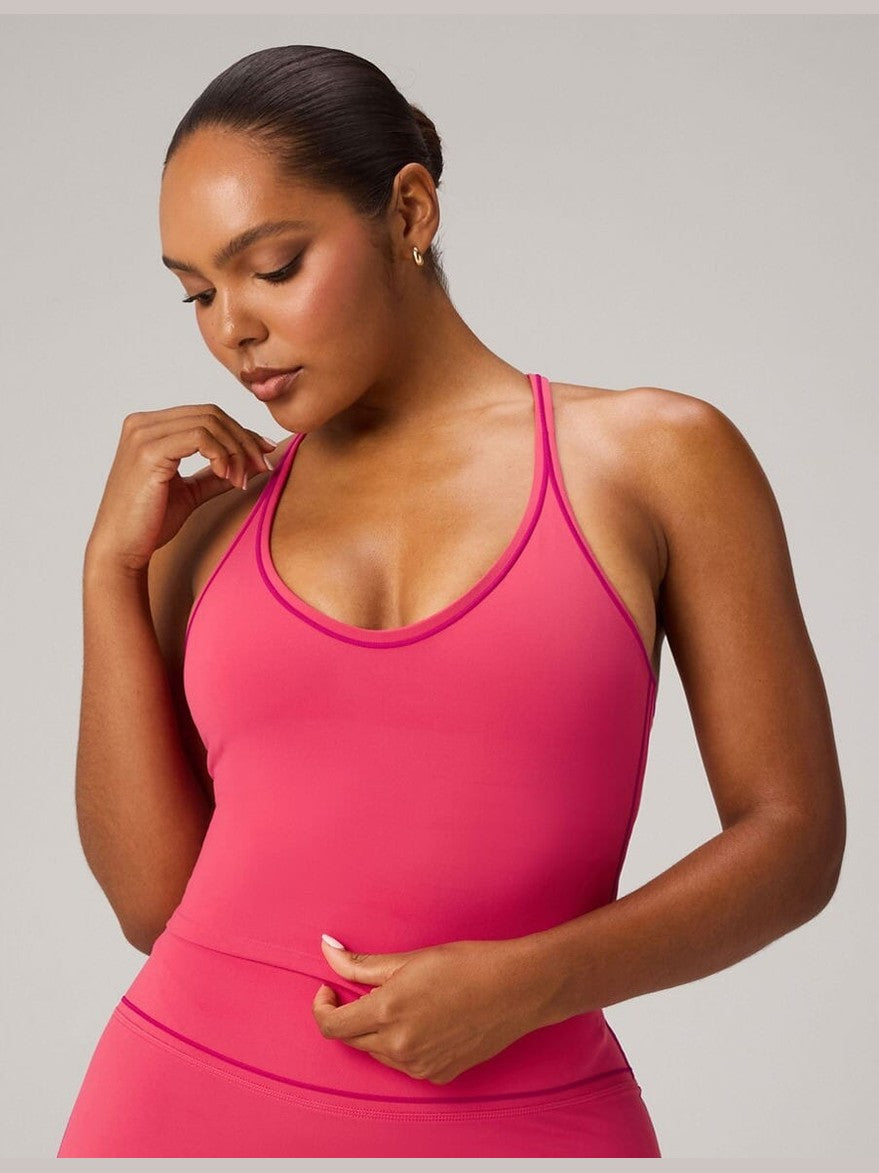 Fabletics PureLuxe fuchsia push-up built-in bra tank with adjustable straps and magenta piping detail