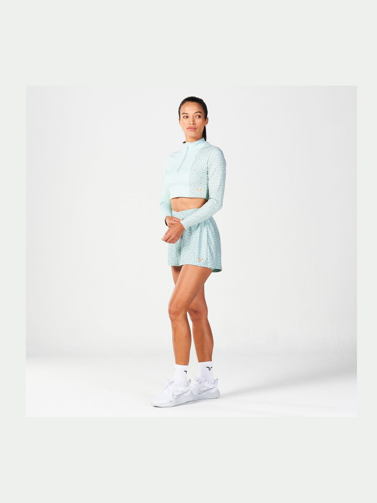 SQUATWOLF QTR ZIP SERPENT TOP