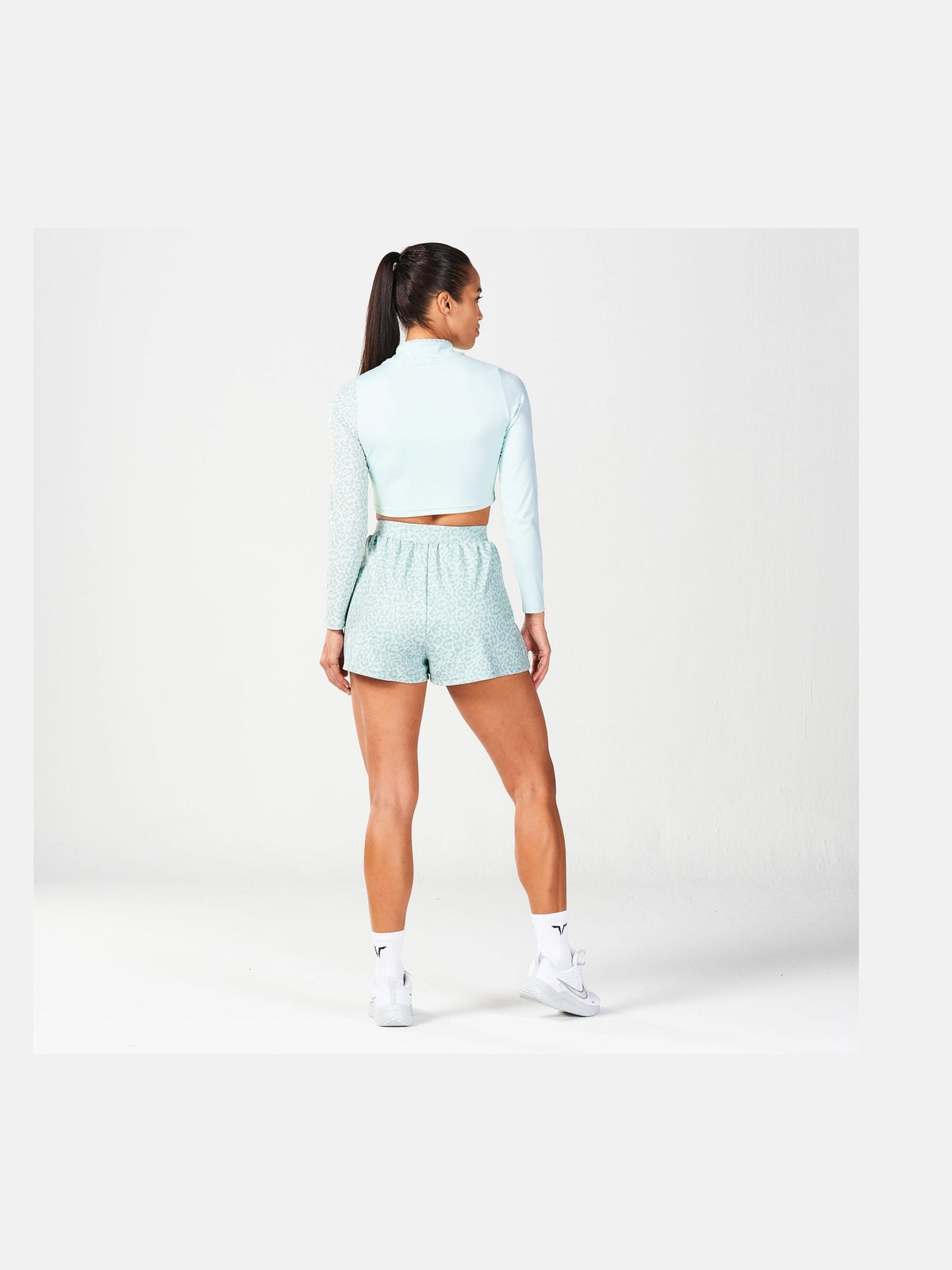 SQUATWOLF QTR ZIP SERPENT TOP